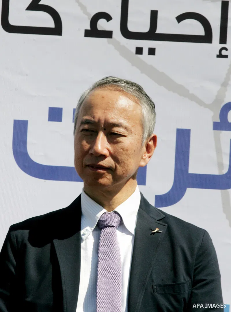 Japanese ambassador for Palestinian Affairs, Takeshi Okubo attends a show of solidarity with the Japanese people in the southern Gaza Strip town of Khan Yunis on March 13, 2018, during an event organised by the United Na...