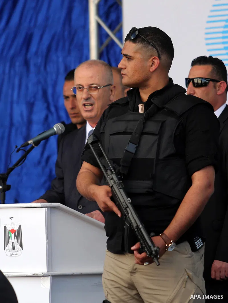 Palestinian Prime Minister Rami Hamdallah speaks during the inauguration ceremony of a waste treatment plant after an explosion targeted his convoy, in the northern Gaza Strip March 13, 2018. Hamdallah cut short a rare v...