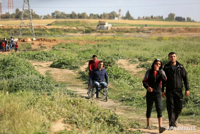 Palestinian protesters clash with Israeli security forces in response to the United States' decision to recognize Jerusalem as the Capital of Israel near the border with Israel in east of Gaza city on March 16, 2018. Aft...