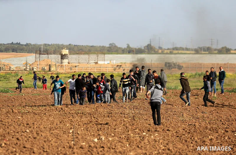 Palestinian protesters clash with Israeli security forces in response to the United States' decision to recognize Jerusalem as the Capital of Israel near the border with Israel in east of Gaza city on March 16, 2018. Aft...