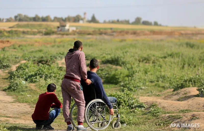 Palestinian protesters clash with Israeli security forces in response to the United States' decision to recognize Jerusalem as the Capital of Israel near the border with Israel in east of Gaza city on March 16, 2018. Aft...