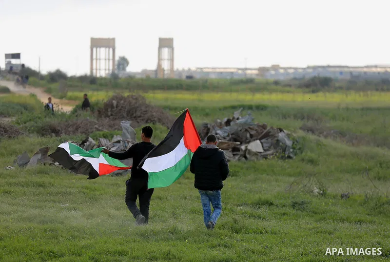 Palestinian protesters clash with Israeli security forces in response to the United States' decision to recognize Jerusalem as the Capital of Israel near the border with Israel in east of Gaza city on March 16, 2018. Aft...