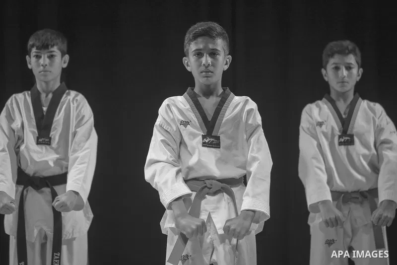 Boys show their skills in karate. Photo by Sanad Ltefa