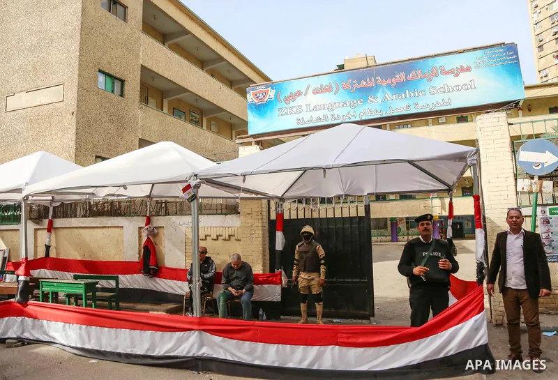 Egypitan security forces stand guard on the first day of the 2018 Egyptian presidential elections, outside a polling station, in Cairo, Egypt, on March 26, 2018. Egyptians head to the polls in a three-day vote to choose...