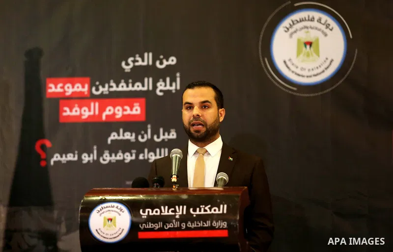 Iyad al-Bozum, an interior ministry spokesman in Gaza Strip speaks during a press conference about the investigations of an explosion that targeted the convoy of Palestinian Prime Minister Rami Hamdallah, in Gaza city on...