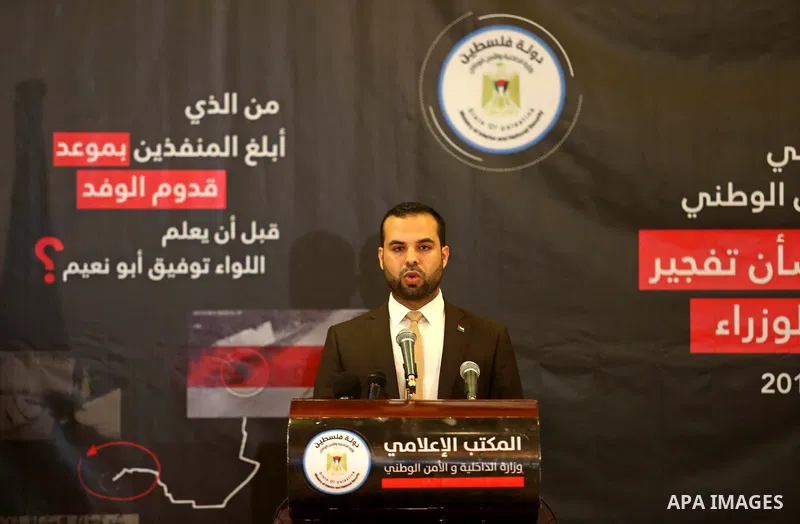 Iyad al-Bozum, an interior ministry spokesman in Gaza Strip speaks during a press conference about the investigations of an explosion that targeted the convoy of Palestinian Prime Minister Rami Hamdallah, in Gaza city on...