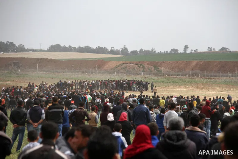 Palestinians take part in a tent city protest along the Israel border with Gaza, demanding the right to return to their homeland, east of Jabalia, in the northern of Gaza Strip on March 30, 2018. Photo by Mahmoud Ajour
