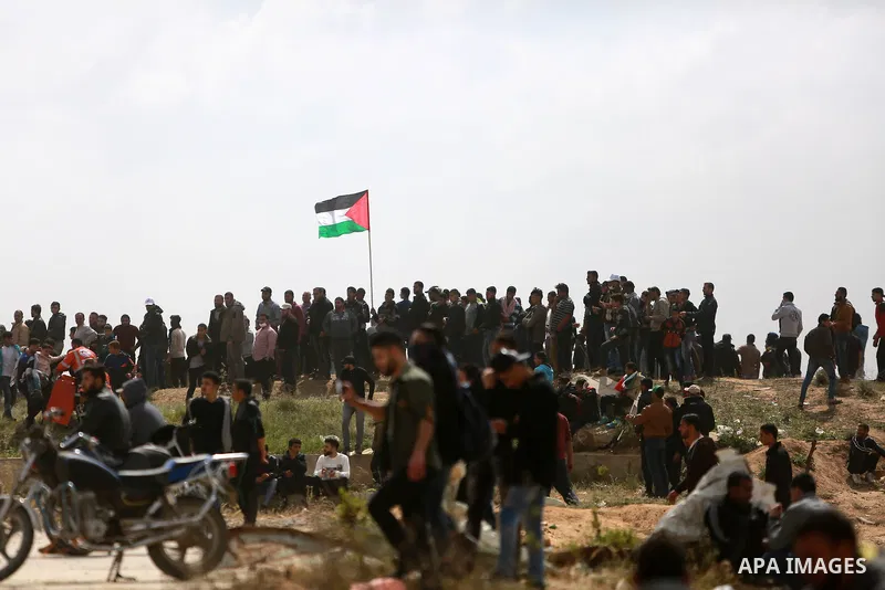 Palestinians take part in a tent city protest along the Israel border with Gaza, demanding the right to return to their homeland, east of Gaza City March 30, 2018. Photo by Mohammed Dahman