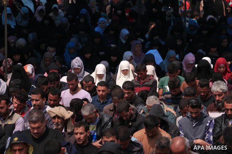 Palestinian Muslim worshippers perform Friday noon prayers during a tent city protest along the Israel border with Gaza, demanding the right to return to their homeland, in Khan Younis in the southern Gaza Strip March 30...
