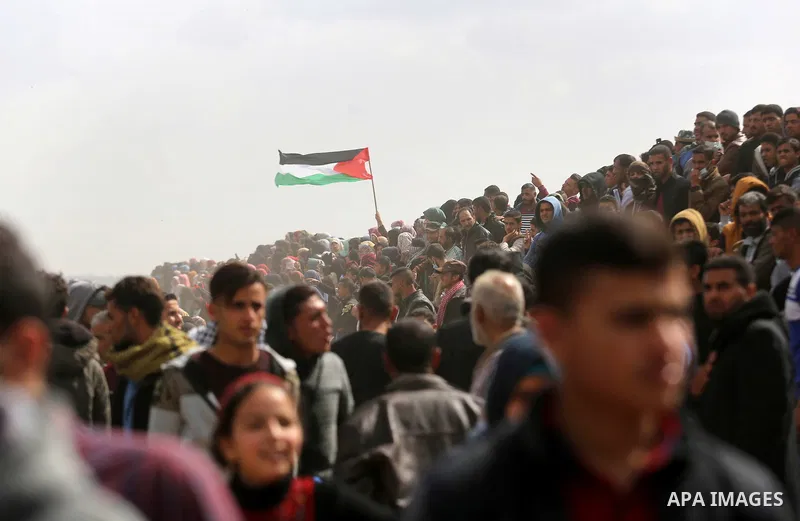 Palestinians take part during a tent city protest along the Israel border with Gaza, demanding the right to return to their homeland, in Khan Younis in the southern Gaza Strip March 30, 2018. Photo by Ashraf Amra