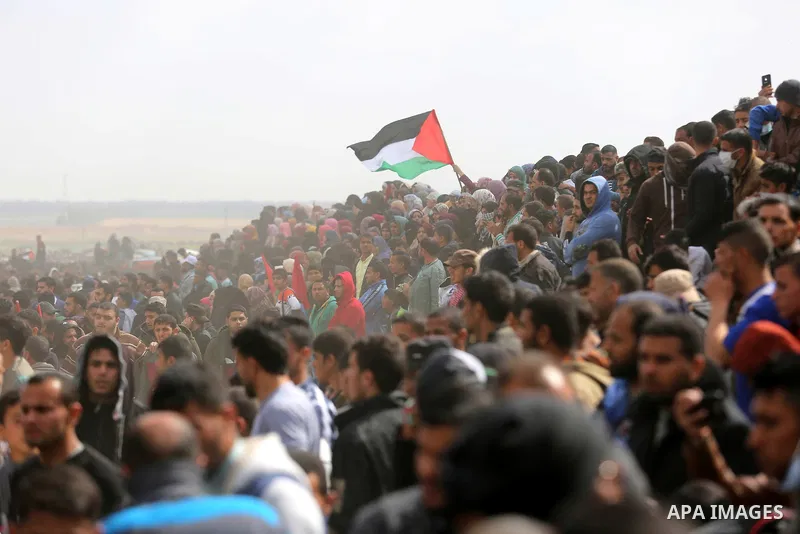 Palestinians take part during a tent city protest along the Israel border with Gaza, demanding the right to return to their homeland, in Khan Younis in the southern Gaza Strip March 30, 2018. Photo by Ashraf Amra