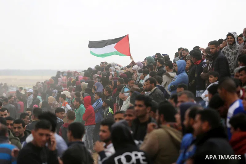 Palestinians take part during a tent city protest along the Israel border with Gaza, demanding the right to return to their homeland, in Khan Younis in the southern Gaza Strip March 30, 2018. Photo by Ashraf Amra