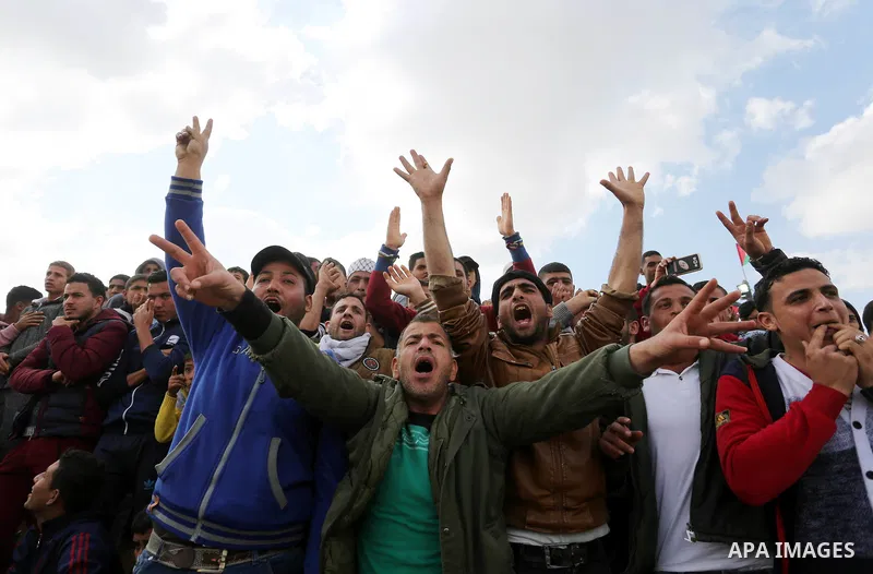 Palestinians take part during a tent city protest along the Israel border with Gaza, demanding the right to return to their homeland, in Khan Younis in the southern Gaza Strip March 30, 2018. Photo by Ashraf Amra