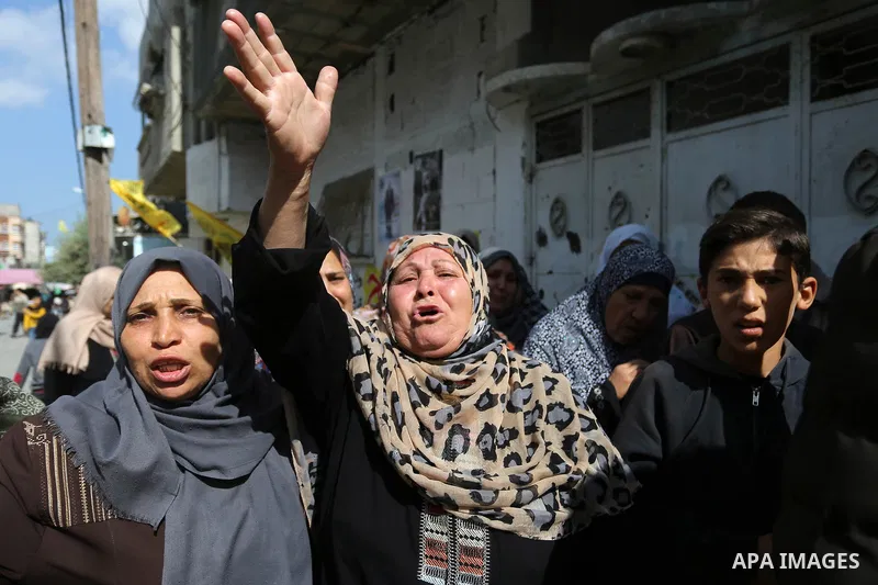 Relatives of Palestinian Hamdan Abu Amshah who was killed a day earlier during clashes with Israeli security forces in a tent city protest along the Israel border with Gaza, demanding the right to return to their homelan...