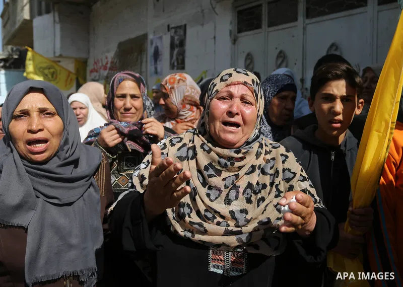 Relatives of Palestinian Hamdan Abu Amshah who was killed a day earlier during clashes with Israeli security forces in a tent city protest along the Israel border with Gaza, demanding the right to return to their homelan...