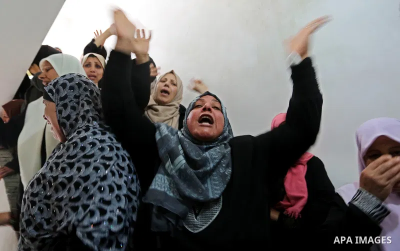 Relatives of Palestinian Hamdan Abu Amshah who was killed a day earlier during clashes with Israeli security forces in a tent city protest along the Israel border with Gaza, demanding the right to return to their homelan...