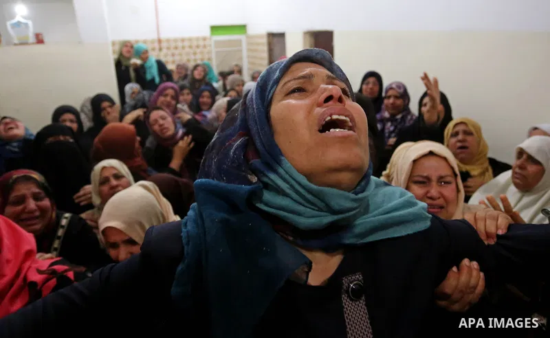 Relatives of Palestinian Hamdan Abu Amshah who was killed a day earlier during clashes with Israeli security forces in a tent city protest along the Israel border with Gaza, demanding the right to return to their homelan...