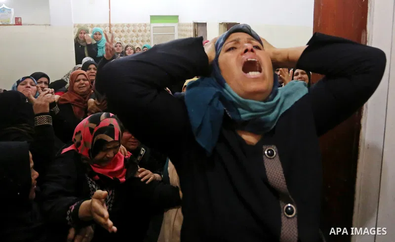 Relatives of Palestinian Hamdan Abu Amshah who was killed a day earlier during clashes with Israeli security forces in a tent city protest along the Israel border with Gaza, demanding the right to return to their homelan...