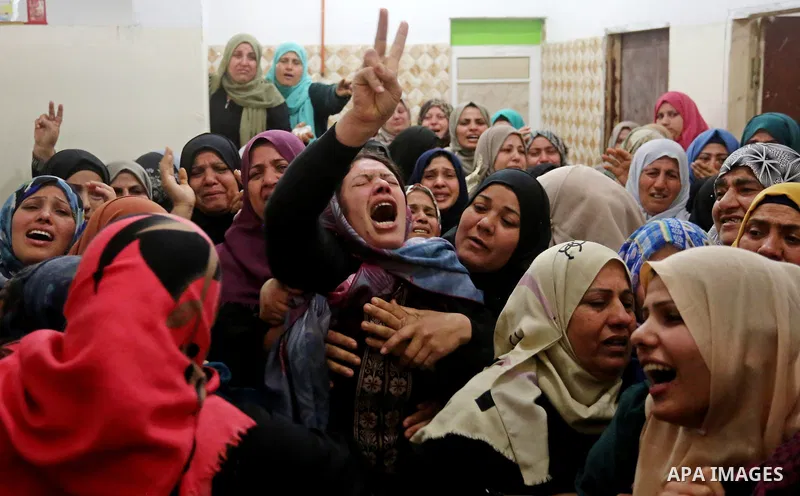 Relatives of Palestinian Hamdan Abu Amshah who was killed a day earlier during clashes with Israeli security forces in a tent city protest along the Israel border with Gaza, demanding the right to return to their homelan...