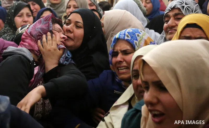 Relatives of Palestinian Hamdan Abu Amshah who was killed a day earlier during clashes with Israeli security forces in a tent city protest along the Israel border with Gaza, demanding the right to return to their homelan...