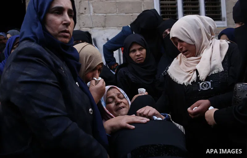 Relatives of Palestinian Jihad Abu Jamous who was killed a day earlier during clashes with Israeli security forces in a tent city protest along the Israel border with Gaza, demanding the right to return to their homeland...