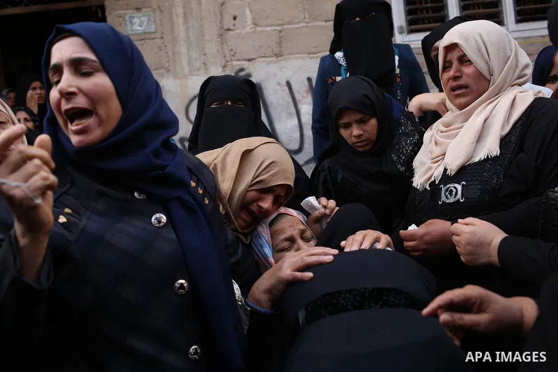 Relatives of Palestinian Jihad Abu Jamous who was killed a day earlier during clashes with Israeli security forces in a tent city protest along the Israel border with Gaza, demanding the right to return to their homeland...