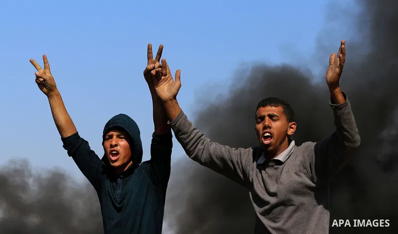Palestinian protesters clash with Israeli security forces during a demonstration near the border with Israel, east of Khan Yunis, in the southern Gaza Strip on March 31, 2018. The UN Security Council heard fears of a fur...