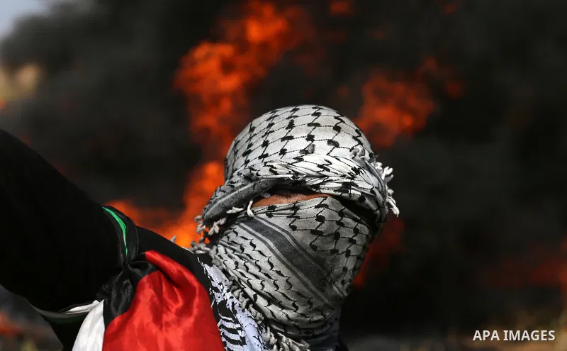 Palestinian protesters clash with Israeli security forces during a demonstration near the border with Israel, east of Khan Yunis, in the southern Gaza Strip on March 31, 2018. The UN Security Council heard fears of a fur...
