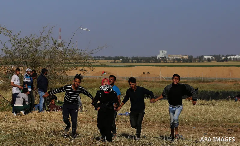 Palestinian protesters clash with Israeli security forces during a demonstration near the border with Israel, east of Khan Yunis, in the southern Gaza Strip on March 31, 2018. The UN Security Council heard fears of a fur...