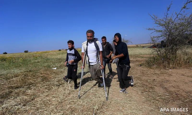 Palestinian protesters clash with Israeli security forces during a demonstration near the border with Israel, east of Khan Yunis, in the southern Gaza Strip on March 31, 2018. The UN Security Council heard fears of a fur...