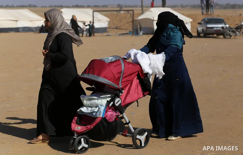 Palestinians take part during a tent city protest along the border with Israel, east of Khan Yunis, in the southern Gaza Strip on March 31, 2018. The UN Security Council heard fears of a further escalation in Israeli-Pal...