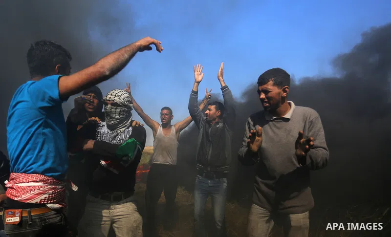 Palestinian protesters clash with Israeli security forces during a demonstration near the border with Israel, east of Khan Yunis, in the southern Gaza Strip on March 31, 2018. The UN Security Council heard fears of a fur...