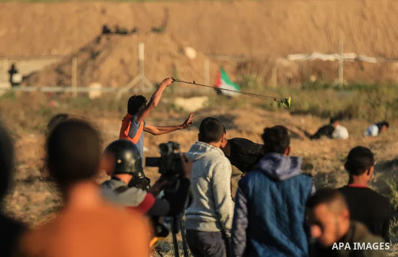Palestinian protesters gather during a protest along the border with Israel, east of Gaza City on March 31, 2018. The UN Security Council heard fears of a further escalation in Israeli-Palestinian violence in the Gaza St...