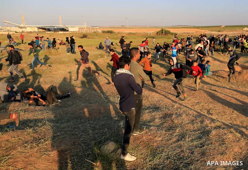 Palestinian protesters gather during a protest along the border with Israel, east of Gaza City on March 31, 2018. The UN Security Council heard fears of a further escalation in Israeli-Palestinian violence in the Gaza St...