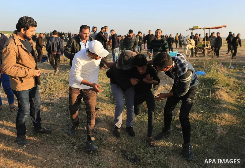 Palestinian protesters gather during a protest along the border with Israel, east of Gaza City on March 31, 2018. The UN Security Council heard fears of a further escalation in Israeli-Palestinian violence in the Gaza St...