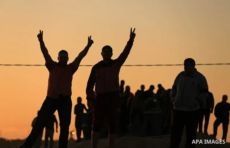 Palestinian protesters gather during a protest along the border with Israel, east of Gaza City on March 31, 2018. The UN Security Council heard fears of a further escalation in Israeli-Palestinian violence in the Gaza St...