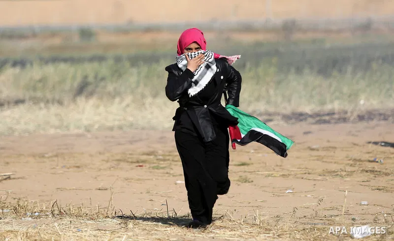 Palestinian protesters clash with Israeli security forces during a demonstration near the border with Israel, east of Khan Yunis, in the southern Gaza Strip on March 31, 2018. The UN Security Council heard fears of a fur...
