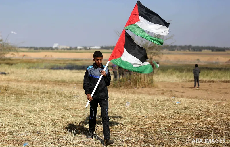 Palestinian protesters clash with Israeli security forces during a demonstration near the border with Israel, east of Khan Yunis, in the southern Gaza Strip on March 31, 2018. The UN Security Council heard fears of a fur...