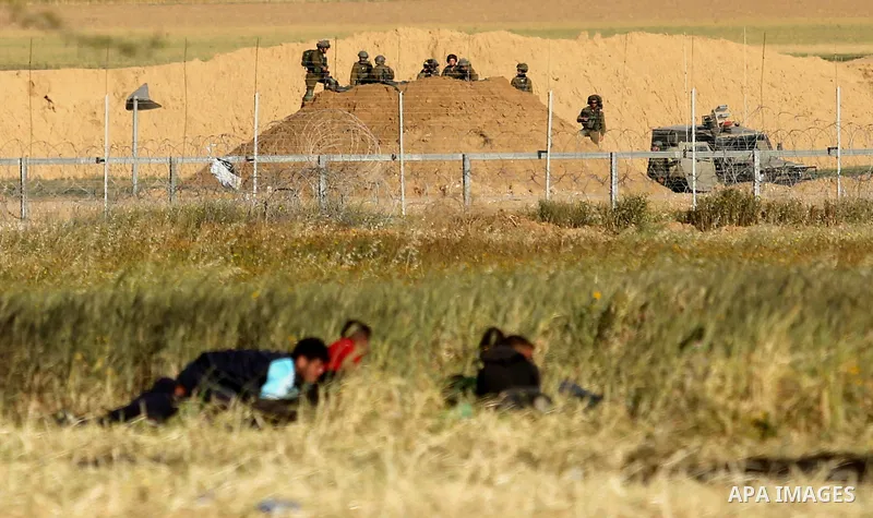 Palestinian protesters clash with Israeli security forces during a demonstration near the border with Israel, east of Khan Yunis, in the southern Gaza Strip on March 31, 2018. The UN Security Council heard fears of a fur...