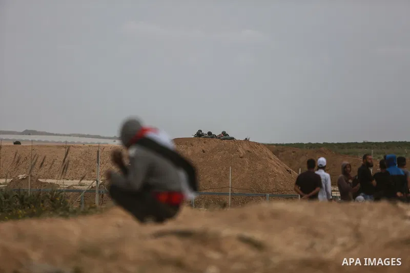 Palestinians take part in a tent city protest along the Israel border with Gaza, demanding the right to return to their homeland, in the east of Gaza city on April 3, 2018. Photo by Mohammed Dahman