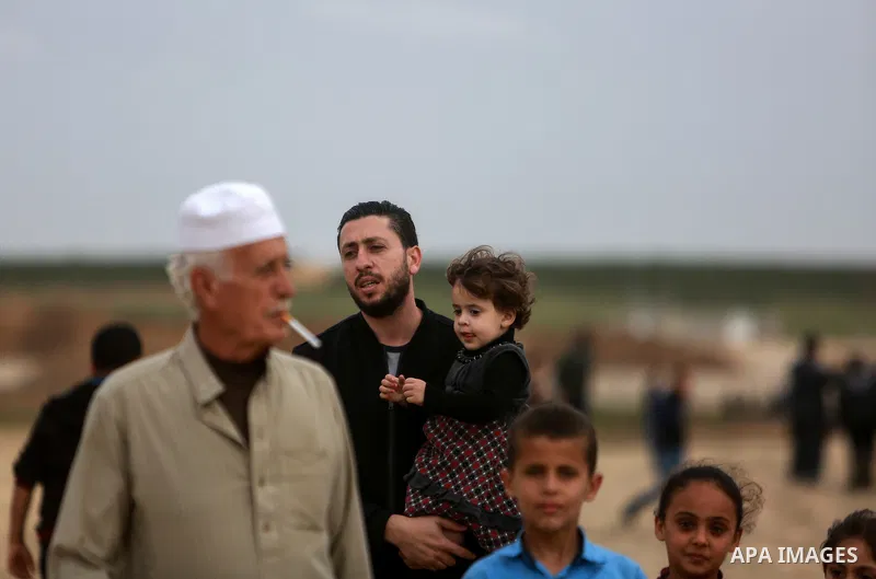 Palestinians take part in a tent city protest along the Israel border with Gaza, demanding the right to return to their homeland, in the east of Gaza city on April 3, 2018. Photo by Mohammed Dahman