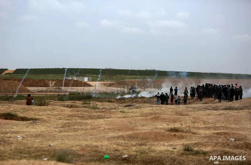 Palestinians take part in a tent city protest along the Israel border with Gaza, demanding the right to return to their homeland, in the east of Gaza city on April 3, 2018. Photo by Mohammed Dahman