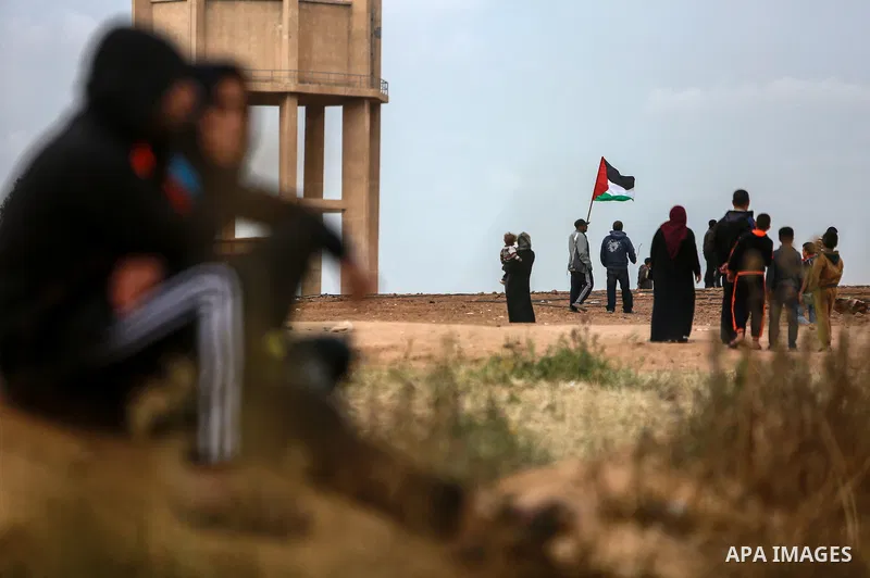 Palestinians take part in a tent city protest along the Israel border with Gaza, demanding the right to return to their homeland, in the east of Gaza city on April 3, 2018. Photo by Mohammed Dahman