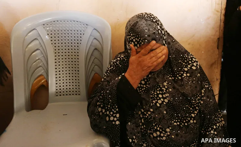Palestinian women mourn during the funeral of 25-year-old Ahmed Arafa in the city of Deir al-Balah, in the centre of the Gaza Strip on April 4, 2018. Arafa was shot dead by Israeli forces on the Gaza border, the health m...