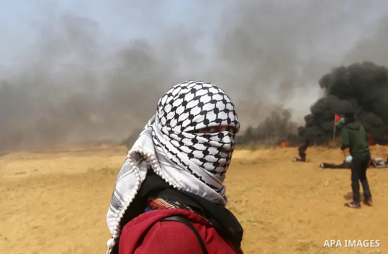 Palestinian protesters gather during clashes with Israeli security forces at the Israel-Gaza border in a tent city protest demanding the right to return to their homeland, in Khan Younis in the southern of Gaza strip on...