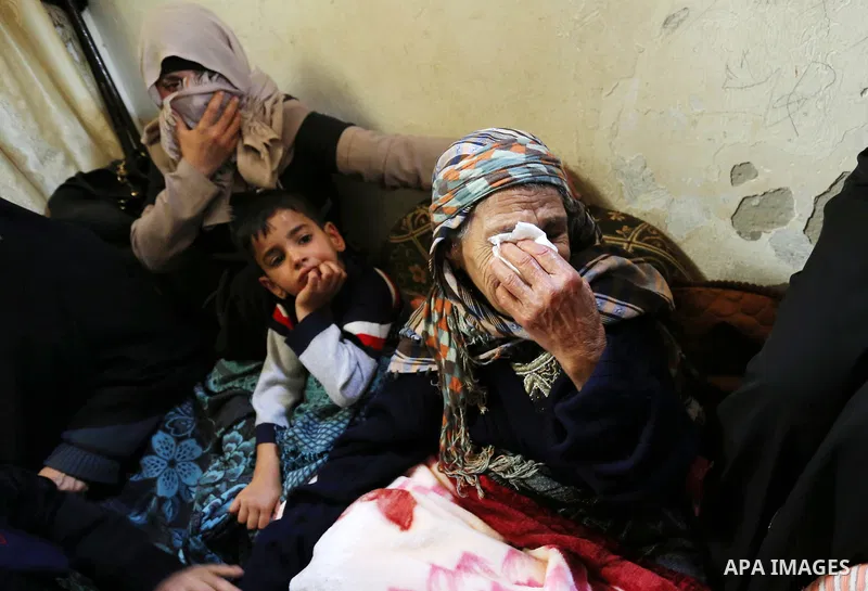 Relatives of Palestinian Alaa al-Zamili, 15, who who died the day before during clashes with Isareli security forces at the Israel-Gaza border, mourn during his funeral in Rafah in the southern Gaza strip on April 7, 201...