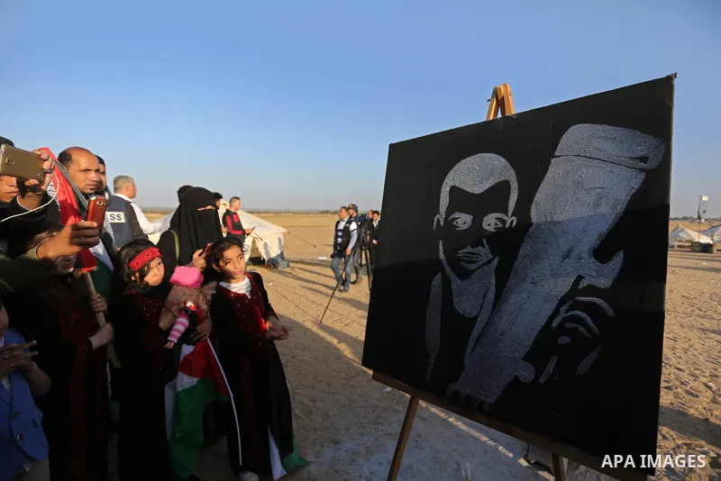 Palestinian journalists take part during a protest demanding to stop Israeli attacks on journalists near the border between Gaza and Israel, in Rafah in the southern Gaza strip on April 8, 2018. Photo by Ashraf Amra