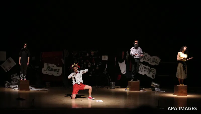 Members of Palestinian band Rasael Theatre perform during the Nablus Festival of Culture and Arts, in the West Bank city of Nablus, on April 17, 2018. Photo by Shadi Jarar'ah