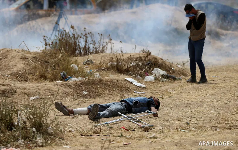 Palestinian protesters clash with Israeli security forces at tents protest at the Israel-Gaza border where Palestinians demand the right to return to their homeland, in east of Gaza city on April 20, 2018. Photo by Yasse...