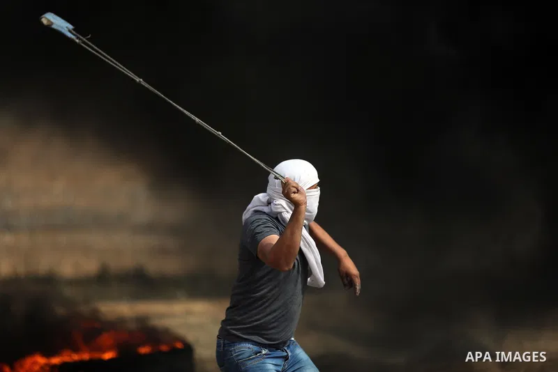 Palestinian protesters clash with Israeli security forces at tents protest at the Israel-Gaza border where Palestinians demand the right to return to their homeland, in east of Gaza city on April 20, 2018. Photo by Yasse...